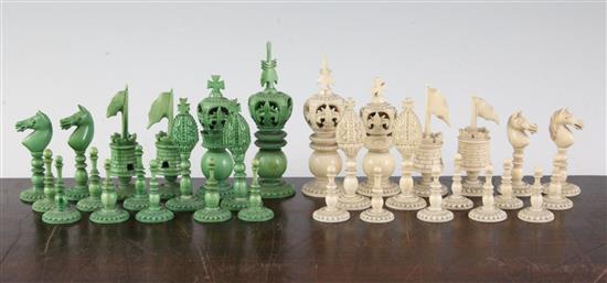 An early 19th century Anglo Indian green stained and plain ivory chess set, kings 4in.